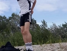 Jon Arteen, the cute Asian twink, in black Adidas attire, freeballing and outdoors.