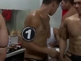 Thai go-go boys in action on stage and backstage