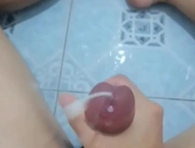 Solo flight of pleasure: Asian beauty gets off on self-pleasure.