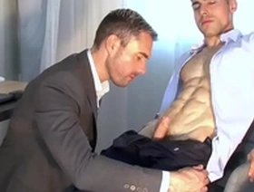 Handsome blonde fitness coach serviced by a huge dick guy.