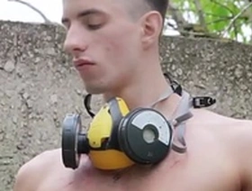 Naked teen boy with soft to hard dick draws bright graffiti outdoor